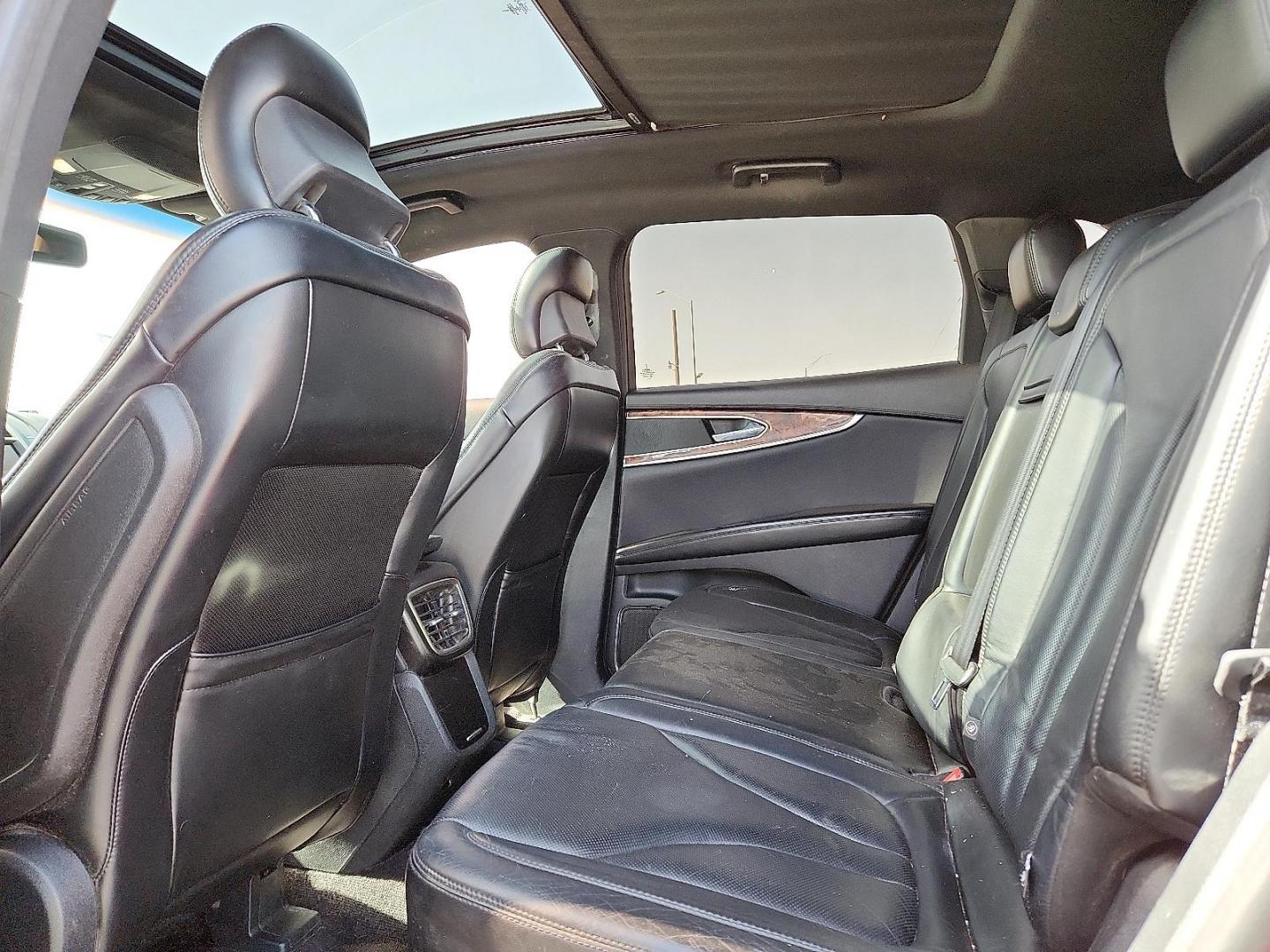 2016 Ruby Red Metallic Tinted Clearcoat - RR /Ebony - BE Lincoln MKX Reserve (2LMTJ8LR4GB) with an 3.7L V-6 DOHC, variable valve control, regular unleaded, engine with 303HP engine, located at 4110 Avenue Q, Lubbock, 79412, 33.556553, -101.855820 - Photo#8