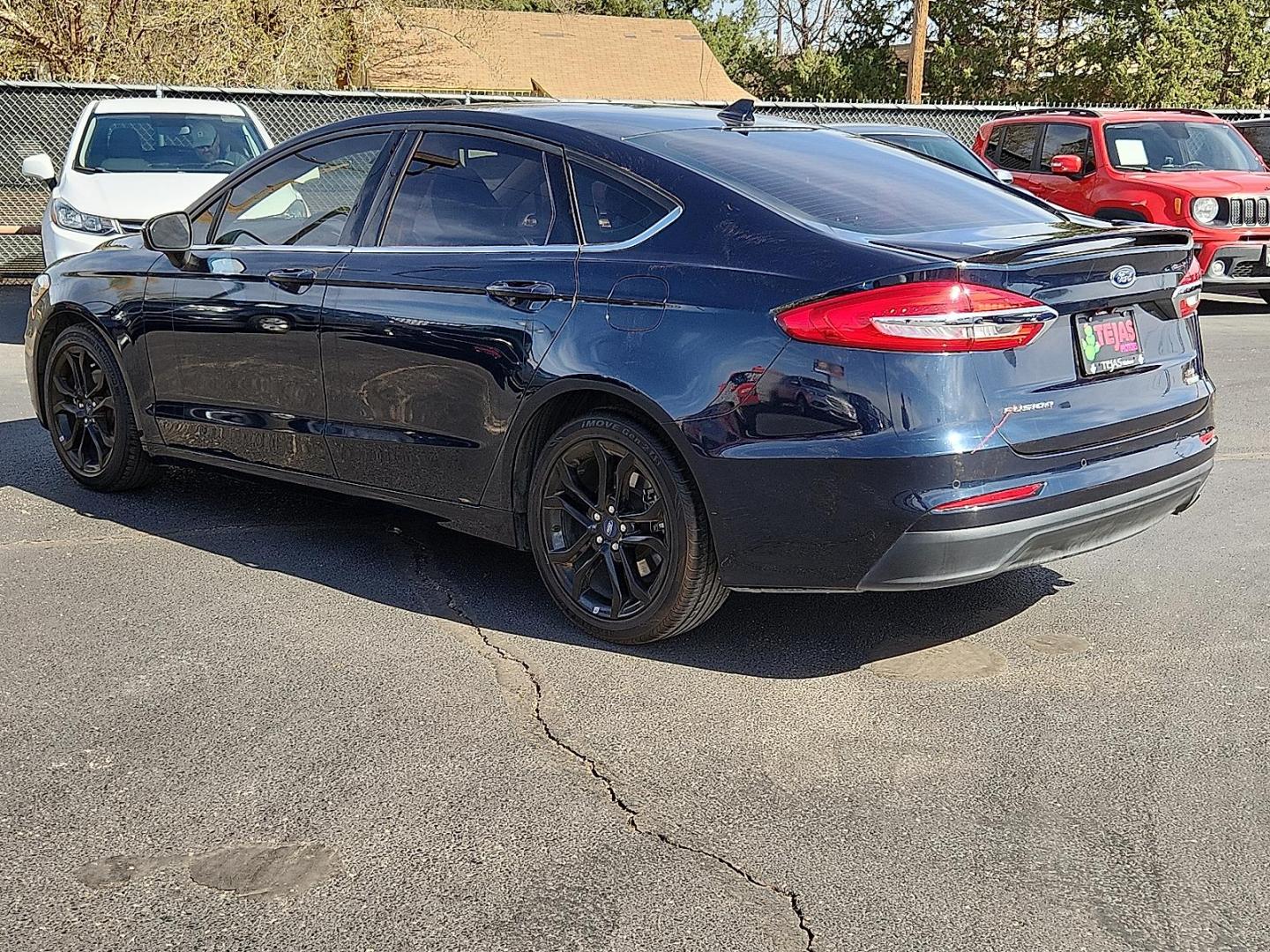2020 Alto Blue Metallic Tinted Clearcoat /Light Putty - ZJ Ford Fusion SE (3FA6P0HD8LR) with an EcoBoost 1.5L I-4 gasoline direct injection, DOHC, variable valve control, intercooled turbo, regular unleaded, engine with 181HP engine, located at 4110 Avenue Q, Lubbock, 79412, 33.556553, -101.855820 - 03/17/2026KEY IN ENVELOPE GOD - Photo#2