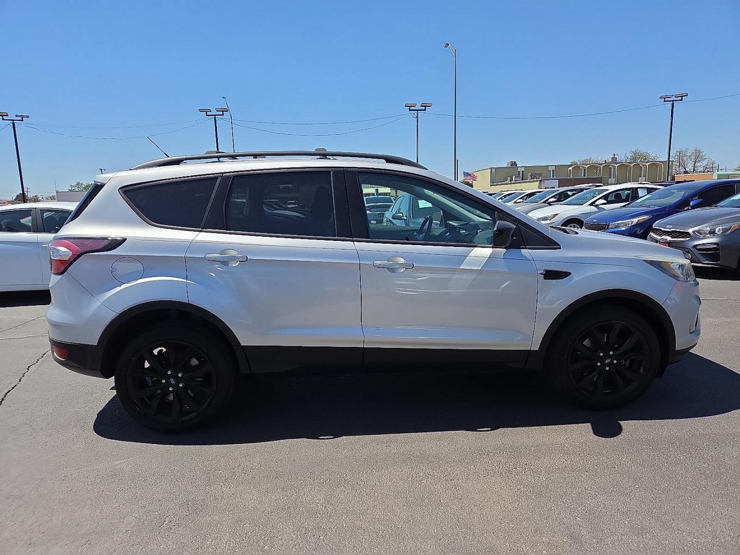 2017 Ingot Silver Metallic - UX /Charcoal Black - DB Ford Escape SE (1FMCU0G98HU) with an EcoBoost 2L I-4 gasoline direct injection, DOHC, variable valve control, intercooled turbo, premium unleaded, engine with 245HP engine, located at 4110 Avenue Q, Lubbock, 79412, 33.556553, -101.855820 - 04/01/2026 KEY IN ENVELOPE GOD - Photo#1