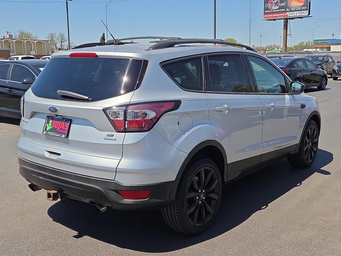 2017 Ingot Silver Metallic - UX /Charcoal Black - DB Ford Escape SE (1FMCU0G98HU) with an EcoBoost 2L I-4 gasoline direct injection, DOHC, variable valve control, intercooled turbo, premium unleaded, engine with 245HP engine, located at 4110 Avenue Q, Lubbock, 79412, 33.556553, -101.855820 - 04/01/2026 KEY IN ENVELOPE GOD - Photo#2