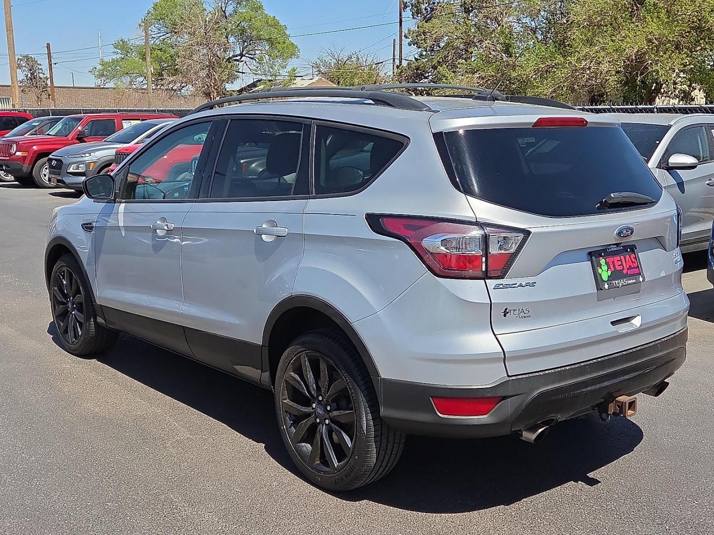 2017 Ingot Silver Metallic - UX /Charcoal Black - DB Ford Escape SE (1FMCU0G98HU) with an EcoBoost 2L I-4 gasoline direct injection, DOHC, variable valve control, intercooled turbo, premium unleaded, engine with 245HP engine, located at 4110 Avenue Q, Lubbock, 79412, 33.556553, -101.855820 - 04/01/2026 KEY IN ENVELOPE GOD - Photo#3