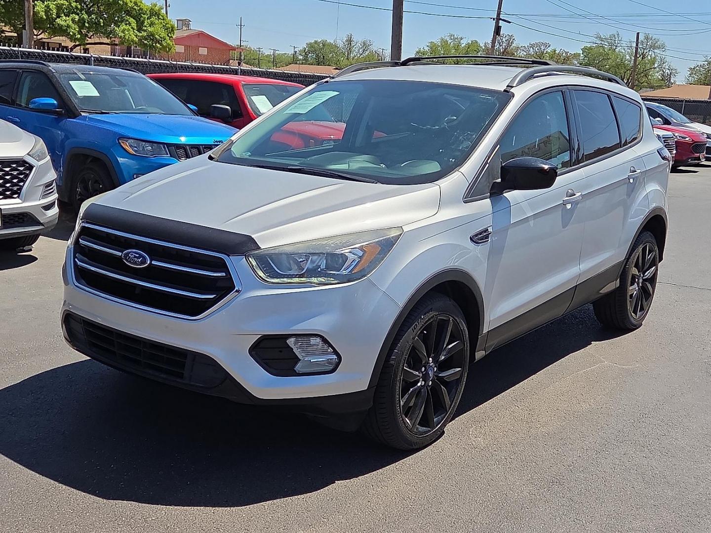 2017 Ingot Silver Metallic - UX /Charcoal Black - DB Ford Escape SE (1FMCU0G98HU) with an EcoBoost 2L I-4 gasoline direct injection, DOHC, variable valve control, intercooled turbo, premium unleaded, engine with 245HP engine, located at 4110 Avenue Q, Lubbock, 79412, 33.556553, -101.855820 - 04/01/2026 KEY IN ENVELOPE GOD - Photo#4