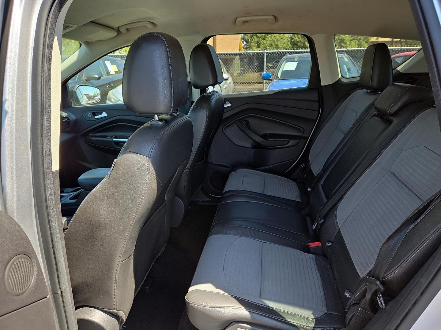 2017 Ingot Silver Metallic - UX /Charcoal Black - DB Ford Escape SE (1FMCU0G98HU) with an EcoBoost 2L I-4 gasoline direct injection, DOHC, variable valve control, intercooled turbo, premium unleaded, engine with 245HP engine, located at 4110 Avenue Q, Lubbock, 79412, 33.556553, -101.855820 - 04/01/2026 KEY IN ENVELOPE GOD - Photo#6