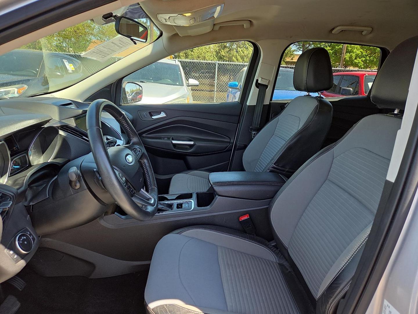 2017 Ingot Silver Metallic - UX /Charcoal Black - DB Ford Escape SE (1FMCU0G98HU) with an EcoBoost 2L I-4 gasoline direct injection, DOHC, variable valve control, intercooled turbo, premium unleaded, engine with 245HP engine, located at 4110 Avenue Q, Lubbock, 79412, 33.556553, -101.855820 - 04/01/2026 KEY IN ENVELOPE GOD - Photo#9