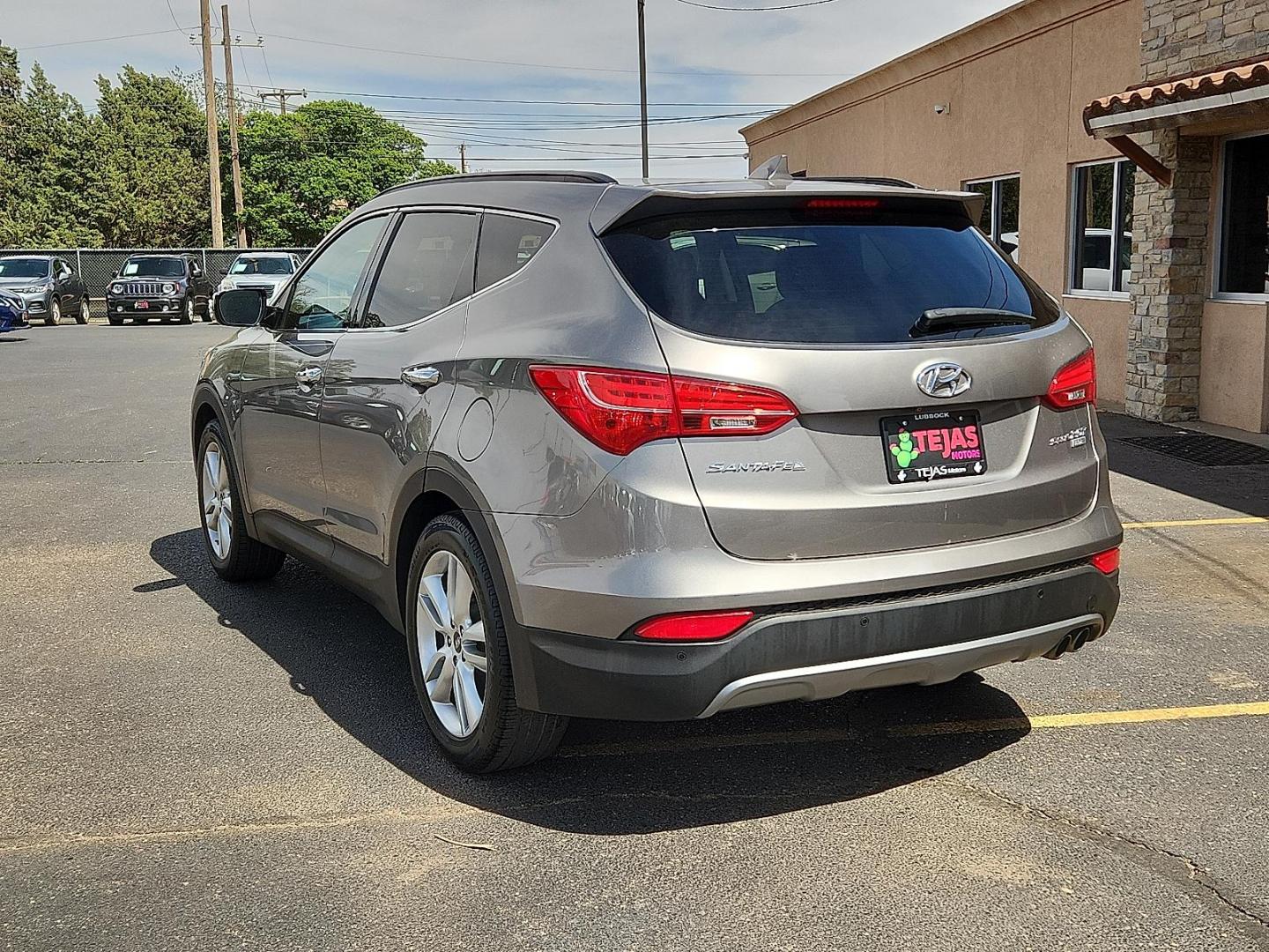 2016 GRAY /Black - RYN Hyundai Santa Fe Sport 2.0L Turbo (5XYZW4LA3GG) with an Theta II 2L I-4 gasoline direct injection, DOHC, variable valve control, intercooled turbo, regular unleaded, engine with 264HP engine, located at 4110 Avenue Q, Lubbock, 79412, 33.556553, -101.855820 - 04/22/2026 KEY IN ENVELOPE GOD - Photo#2