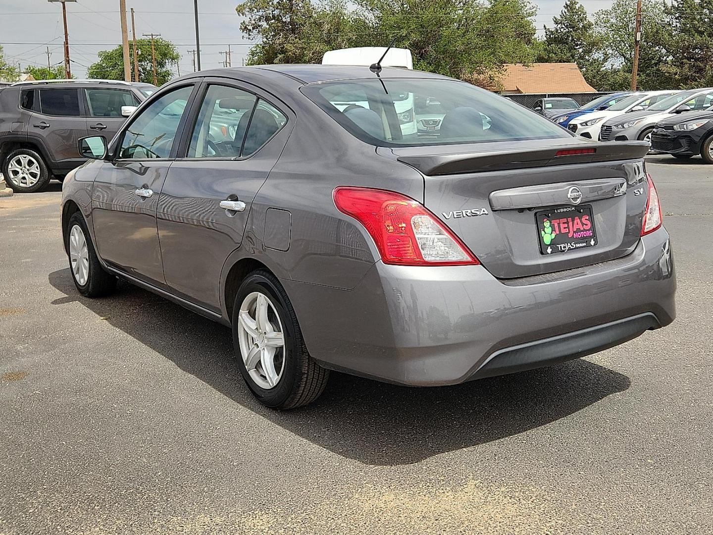 2019 GRAY /Charcoal - G Nissan Versa 1.6 SV (3N1CN7AP1KL) with an 1.6L I-4 DOHC, variable valve control, regular unleaded, engine with 109HP engine, located at 4110 Avenue Q, Lubbock, 79412, 33.556553, -101.855820 - Photo#2