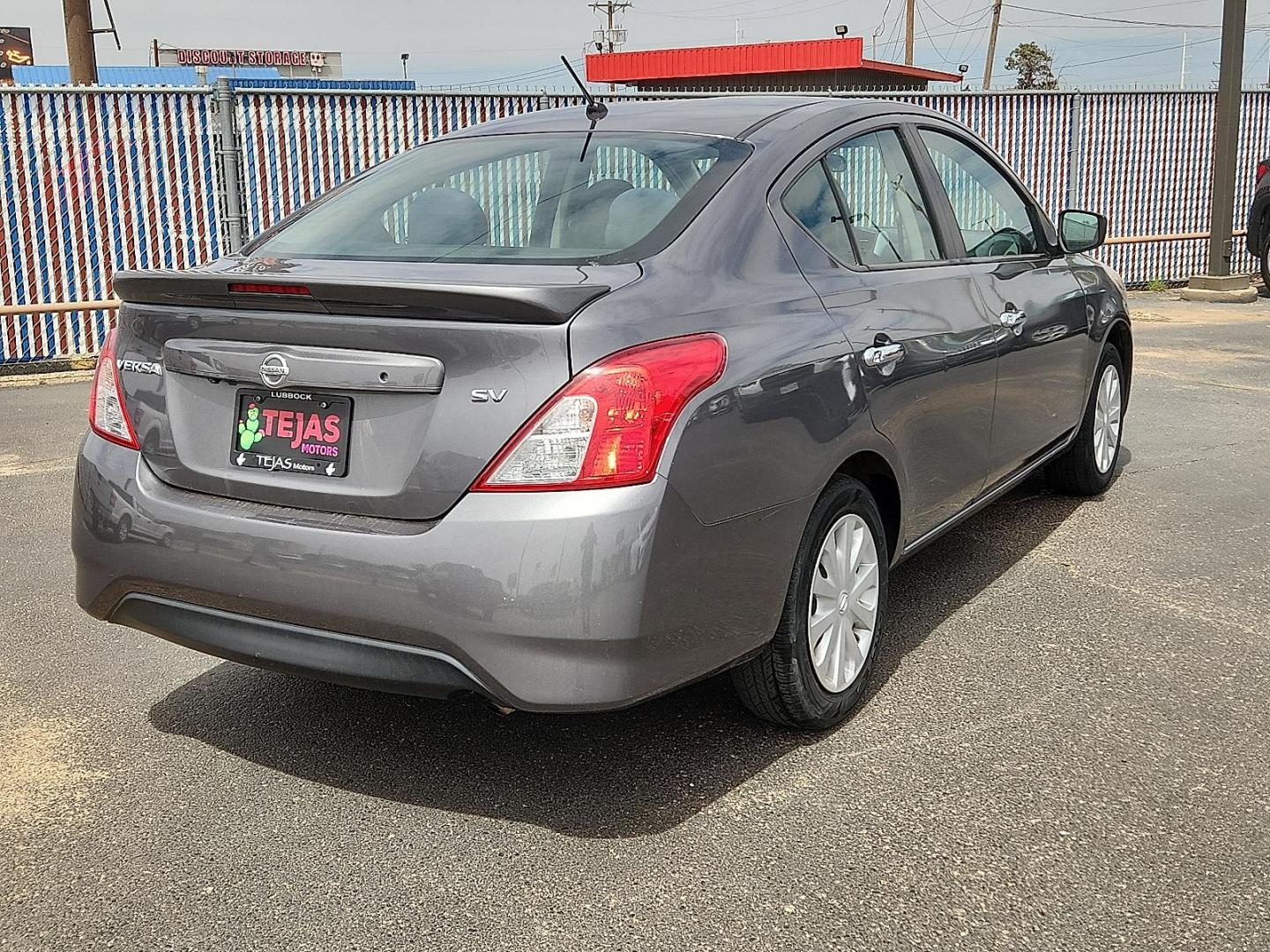 2019 GRAY /Charcoal - G Nissan Versa 1.6 SV (3N1CN7AP1KL) with an 1.6L I-4 DOHC, variable valve control, regular unleaded, engine with 109HP engine, located at 4110 Avenue Q, Lubbock, 79412, 33.556553, -101.855820 - Photo#3