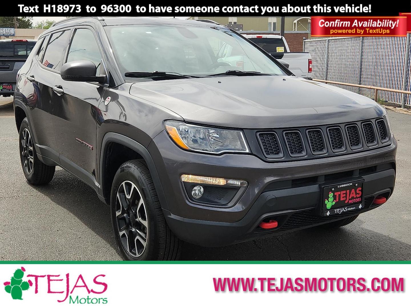 2020 GRAY /Ruby Red/Black - XC Jeep Compass Trailhawk 4x4 (3C4NJDDB8LT) with an 2.4L I-4 variable valve control, regular unleaded, engine with 180HP engine, located at 4110 Avenue Q, Lubbock, 79412, 33.556553, -101.855820 - 04/23/2026 KEY IN ENVELOPE GOD - Photo#0