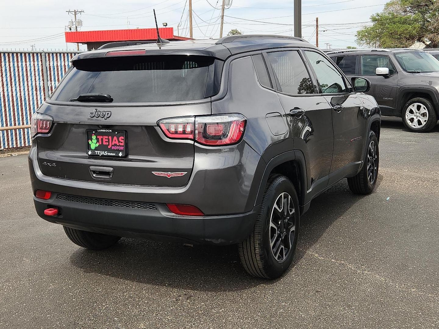 2020 GRAY /Ruby Red/Black - XC Jeep Compass Trailhawk 4x4 (3C4NJDDB8LT) with an 2.4L I-4 variable valve control, regular unleaded, engine with 180HP engine, located at 4110 Avenue Q, Lubbock, 79412, 33.556553, -101.855820 - 04/23/2026 KEY IN ENVELOPE GOD - Photo#3