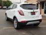 2019 Summit White /Ebony - AFN Buick Encore FWD Preferred (KL4CJASB4KB) with an Ecotec 1.4L I-4 DOHC, variable valve control, intercooled turbo, regular unleaded, engine with 138HP engine, located at 4110 Avenue Q, Lubbock, 79412, 33.556553, -101.855820 - 04/28/2026 KEY IN ENVELOPE GOD - Photo#2