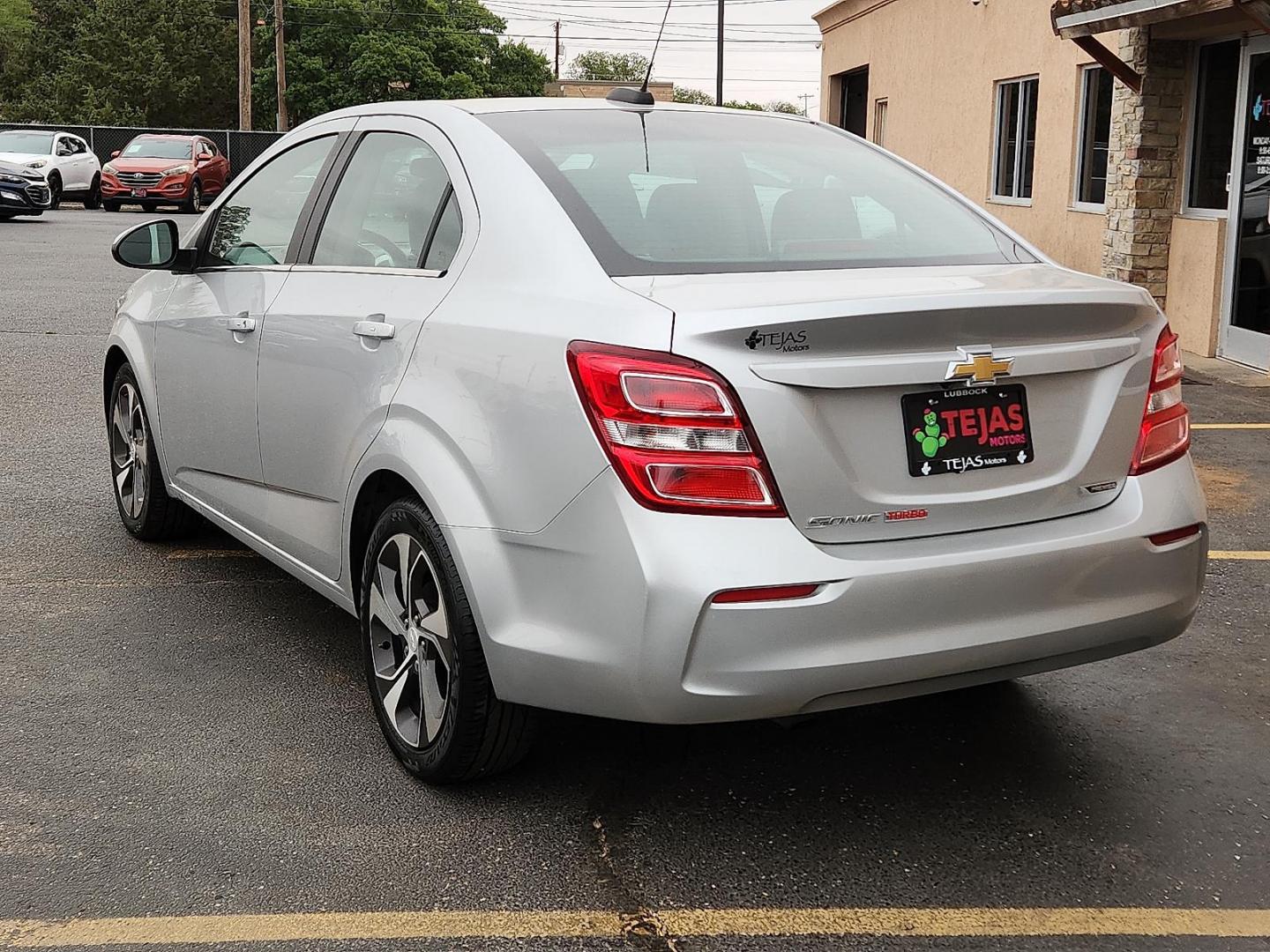 2018 SILVER /Jet Black/Dark Titanium - ACI Chevrolet Sonic Premier Auto (1G1JF5SB6J4) with an ECOTEC 1.4L I-4 DOHC, VVT variable valve control, intercooled turbo, regular unleaded, engine with 138HP engine, located at 4110 Avenue Q, Lubbock, 79412, 33.556553, -101.855820 - 04/28/2026 KEY IN ENVELOPE GOD - Photo#2