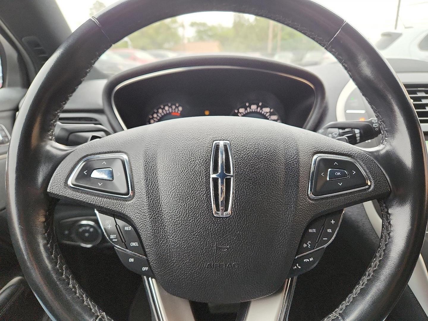 2017 GOLD /Ebony - 42 Lincoln MKC Reserve (5LMCJ3C90HU) with an 2L I-4 gasoline direct injection, DOHC, variable valve control, intercooled turbo, premium unleaded, engine with 240HP engine, located at 4110 Avenue Q, Lubbock, 79412, 33.556553, -101.855820 - 04/28/2026 KEY IN ENVELOPE GOD - Photo#10
