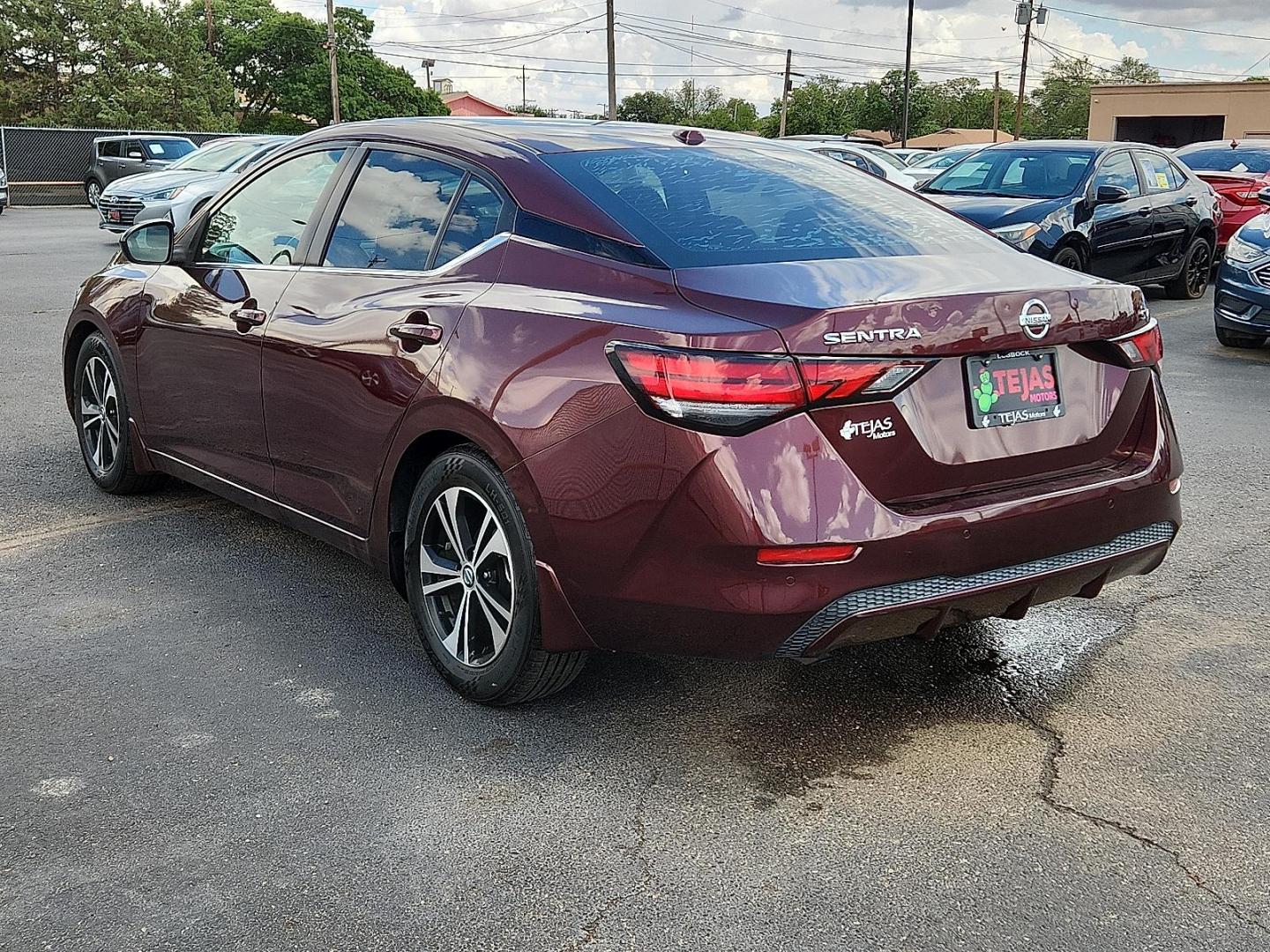 2021 RED /Charcoal - G Nissan Sentra SV Xtronic CVT (3N1AB8CV8MY) with an 2L I-4 gasoline direct injection, DOHC, variable valve control, regular unleaded, engine with 149HP engine, located at 4110 Avenue Q, Lubbock, 79412, 33.556553, -101.855820 - 06/03/2026 KEY IN ENVELOPE GOD - Photo#2