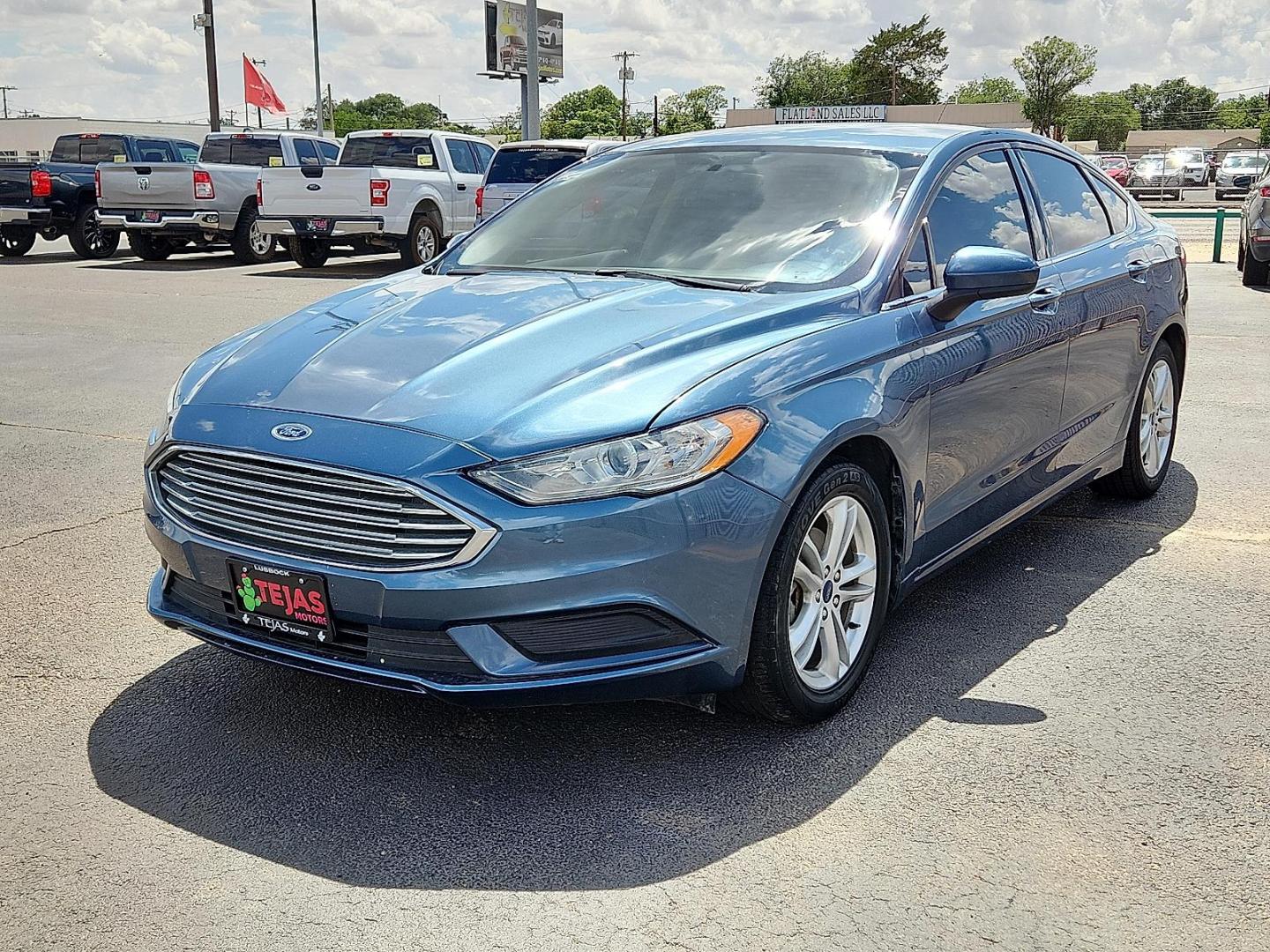 2018 BLUE /Ebony - DT Ford Fusion SE (3FA6P0HD0JR) with an EcoBoost 1.5L I-4 gasoline direct injection, DOHC, Ti-VCT variable valve control, intercooled turbo, regular unleaded, engine with 181HP engine, located at 4110 Avenue Q, Lubbock, 79412, 33.556553, -101.855820 - 06/03/2026 KEY IN ENVELOPE GOD - Photo#1