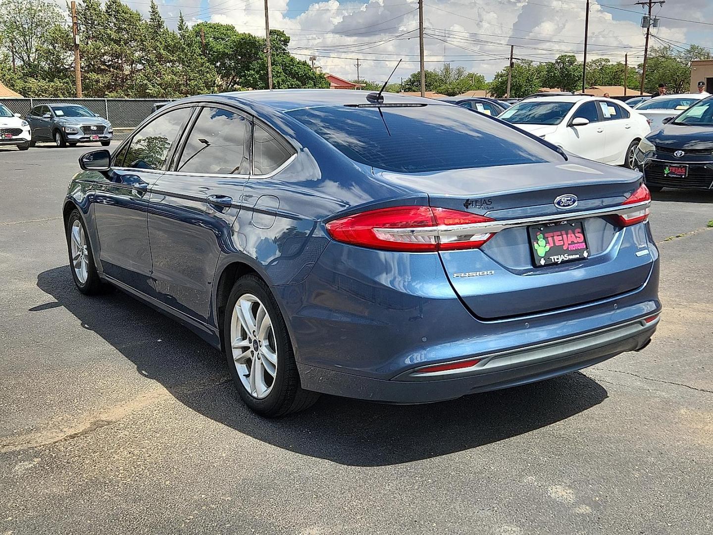 2018 BLUE /Ebony - DT Ford Fusion SE (3FA6P0HD0JR) with an EcoBoost 1.5L I-4 gasoline direct injection, DOHC, Ti-VCT variable valve control, intercooled turbo, regular unleaded, engine with 181HP engine, located at 4110 Avenue Q, Lubbock, 79412, 33.556553, -101.855820 - 06/03/2026 KEY IN ENVELOPE GOD - Photo#2