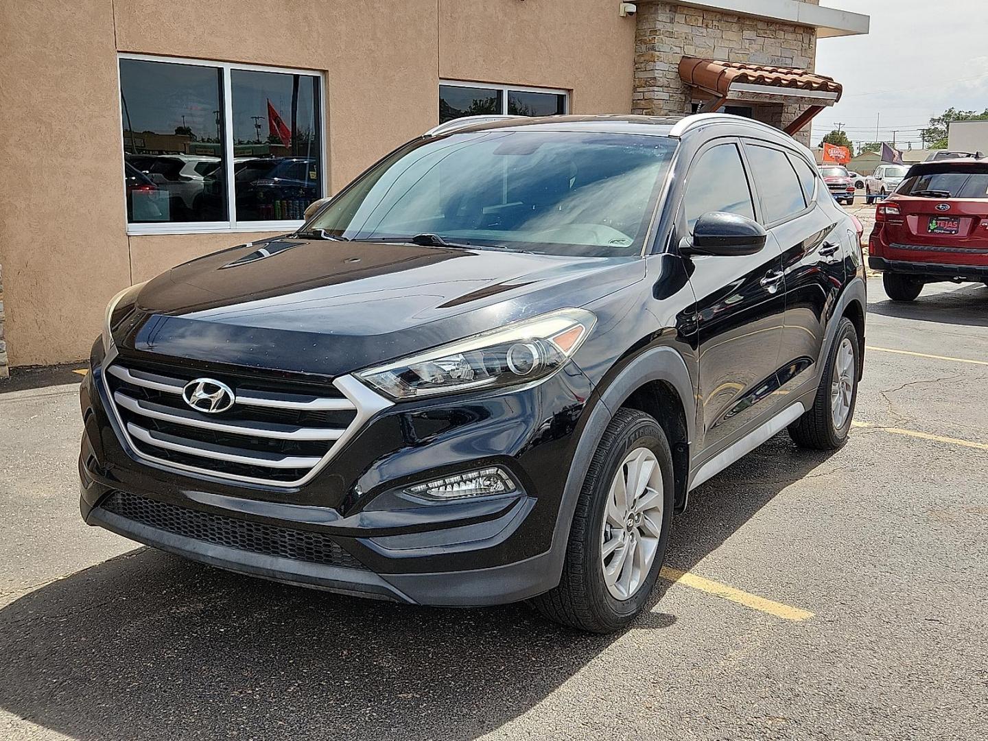2017 BLACK /Black - TRY Hyundai Tucson SE (KM8J33A40HU) with an Nu 2L I-4 gasoline direct injection, DOHC, D-CVVT variable valve control, regular unleaded, engine with 164HP engine, located at 4110 Avenue Q, Lubbock, 79412, 33.556553, -101.855820 - Photo#1