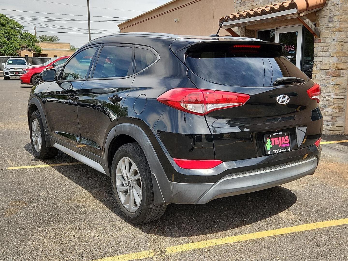 2017 BLACK /Black - TRY Hyundai Tucson SE (KM8J33A40HU) with an Nu 2L I-4 gasoline direct injection, DOHC, D-CVVT variable valve control, regular unleaded, engine with 164HP engine, located at 4110 Avenue Q, Lubbock, 79412, 33.556553, -101.855820 - Photo#2