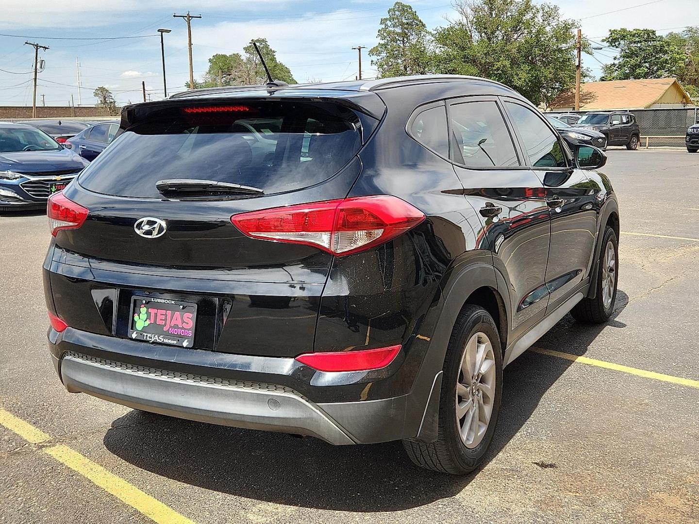 2017 BLACK /Black - TRY Hyundai Tucson SE (KM8J33A40HU) with an Nu 2L I-4 gasoline direct injection, DOHC, D-CVVT variable valve control, regular unleaded, engine with 164HP engine, located at 4110 Avenue Q, Lubbock, 79412, 33.556553, -101.855820 - Photo#3