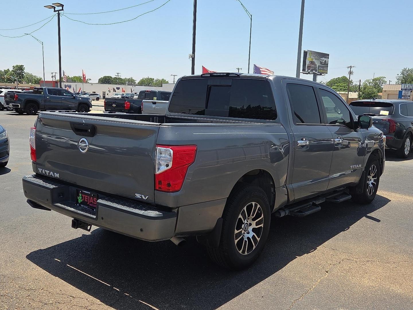 2021 Gun Metallic - KAD /Black - G Nissan TITAN Crew Cab SV 4x2 (1N6AA1EFXMN) with an Endurance 5.6L V-8 gasoline direct injection, DOHC, variable valve control, premium unleaded, engine with 400HP engine, located at 4110 Avenue Q, Lubbock, 79412, 33.556553, -101.855820 - 06/06/2026 KEY IN ENVELOPE GOD - Photo#2