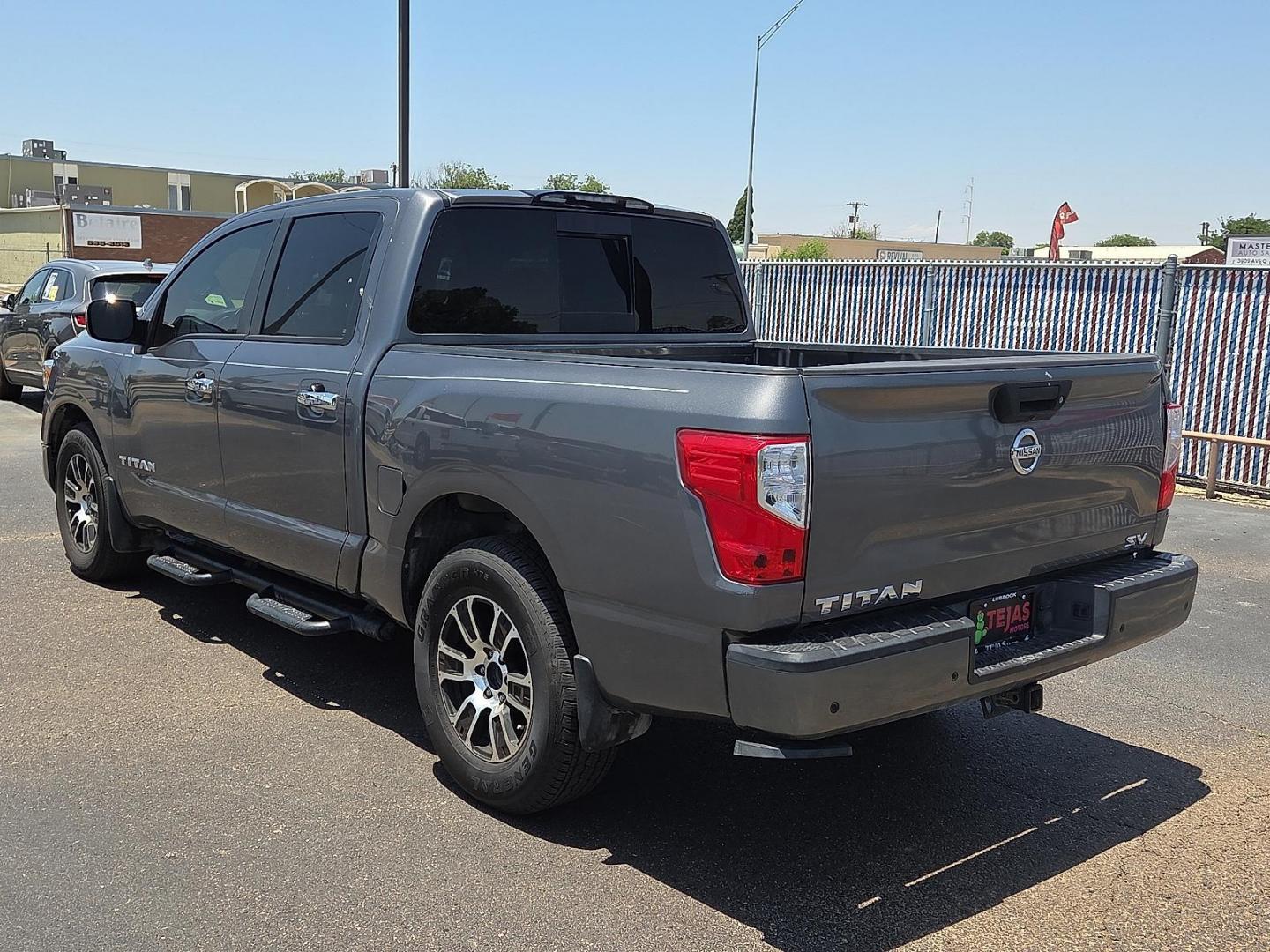 2021 Gun Metallic - KAD /Black - G Nissan TITAN Crew Cab SV 4x2 (1N6AA1EFXMN) with an Endurance 5.6L V-8 gasoline direct injection, DOHC, variable valve control, premium unleaded, engine with 400HP engine, located at 4110 Avenue Q, Lubbock, 79412, 33.556553, -101.855820 - 06/06/2026 KEY IN ENVELOPE GOD - Photo#3