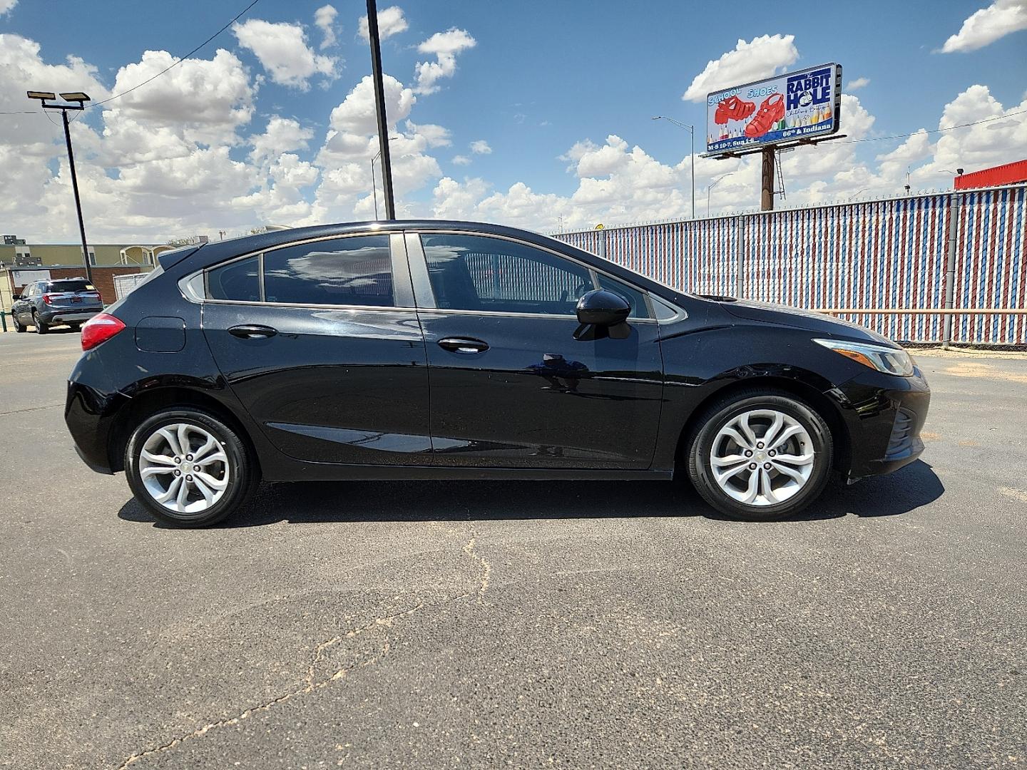 2019 Black /Grey Chevrolet Cruze LS (3G1BC6SM5KS) with an 1.4L I-4 gasoline direct injection, DOHC, VVT variable valve control, intercooled turbo, regular unleaded, engine with 153HP engine, located at 4110 Avenue Q, Lubbock, 79412, 33.556553, -101.855820 - 08/08/2026 KEY IN ENVELOPE GOD- Photo#1