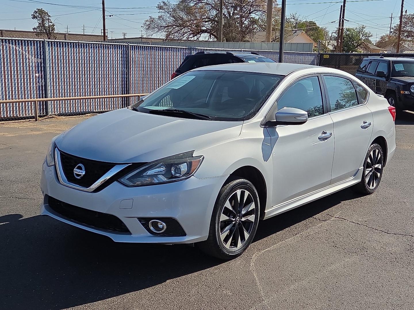 2017 Brilliant Silver - K23 /Charcoal - G Nissan Sentra SR (3N1AB7AP5HY) with an 1.8L I-4 DOHC, variable valve control, regular gasoline, engine with 124HP engine, located at 4110 Avenue Q, Lubbock, 79412, 33.556553, -101.855820- Photo#4