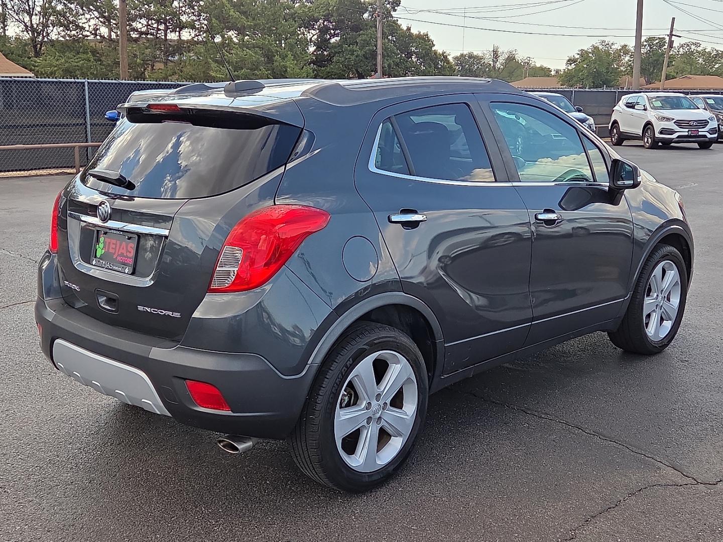 2016 Graphite Gray Metallic - GK2 /Ebony - AFN Buick Encore (KL4CJASB1GB) with an Ecotec 1.4L I-4 DOHC, variable valve control, intercooled turbo, regular gasoline, engine with 138HP engine, located at 4110 Avenue Q, Lubbock, 79412, 33.556553, -101.855820- Photo#2