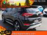 2017 BLACK Hyundai Tucson Limited (KM8J33A23HU) with an 1.6L I-4 direct injection, DOHC, D-CVVT variable valve control, intercooled turbo, regular gasoline, engine with 175HP engine, located at 4110 Avenue Q, Lubbock, 79412, 33.556553, -101.855820- Photo#2