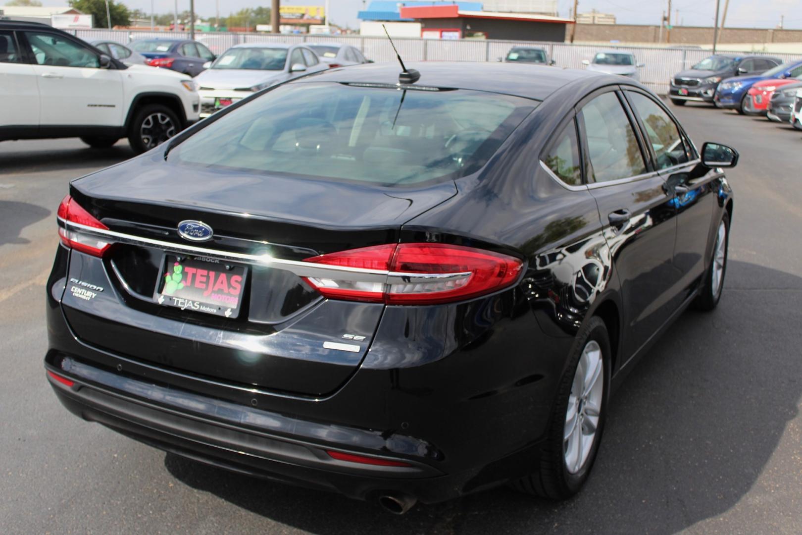 2018 Ford Fusion SE (3FA6P0HD3JR) with an 1.5L L4 DOHC 16V engine, 6A transmission, located at 4110 Avenue Q, Lubbock, 79412, 33.556553, -101.855820- Photo#3
