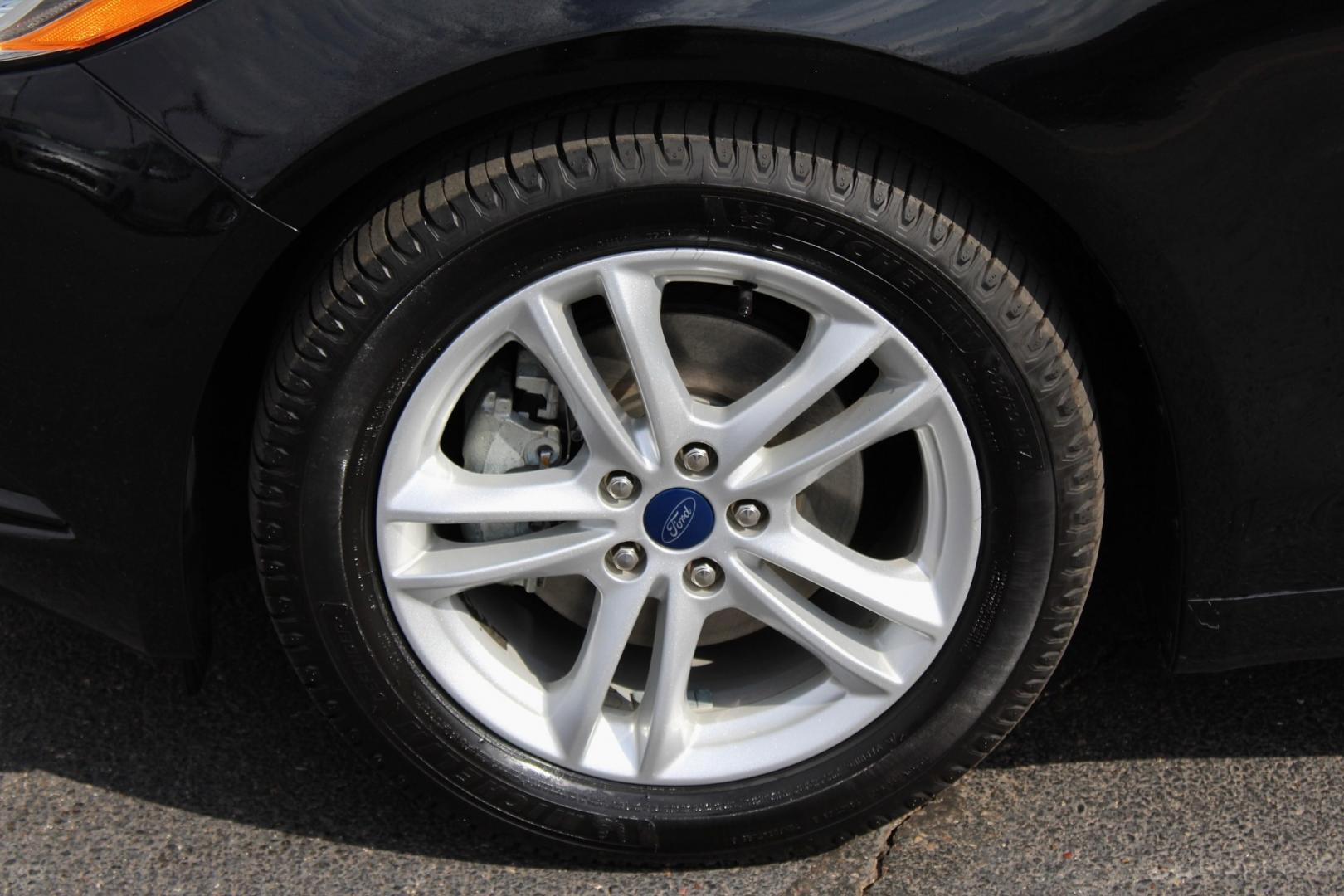 2018 Ford Fusion SE (3FA6P0HD3JR) with an 1.5L L4 DOHC 16V engine, 6A transmission, located at 4110 Avenue Q, Lubbock, 79412, 33.556553, -101.855820- Photo#4