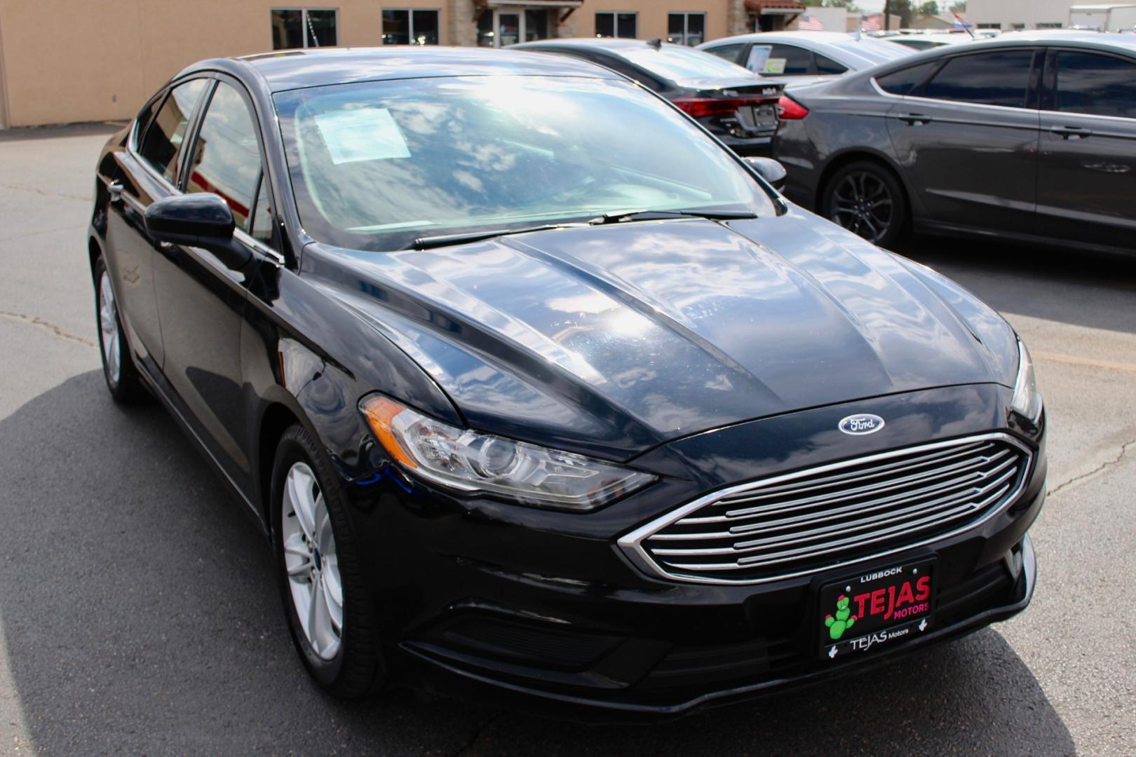 2018 Ford Fusion SE (3FA6P0HD3JR) with an 1.5L L4 DOHC 16V engine, 6A transmission, located at 4110 Avenue Q, Lubbock, 79412, 33.556553, -101.855820- Photo#0
