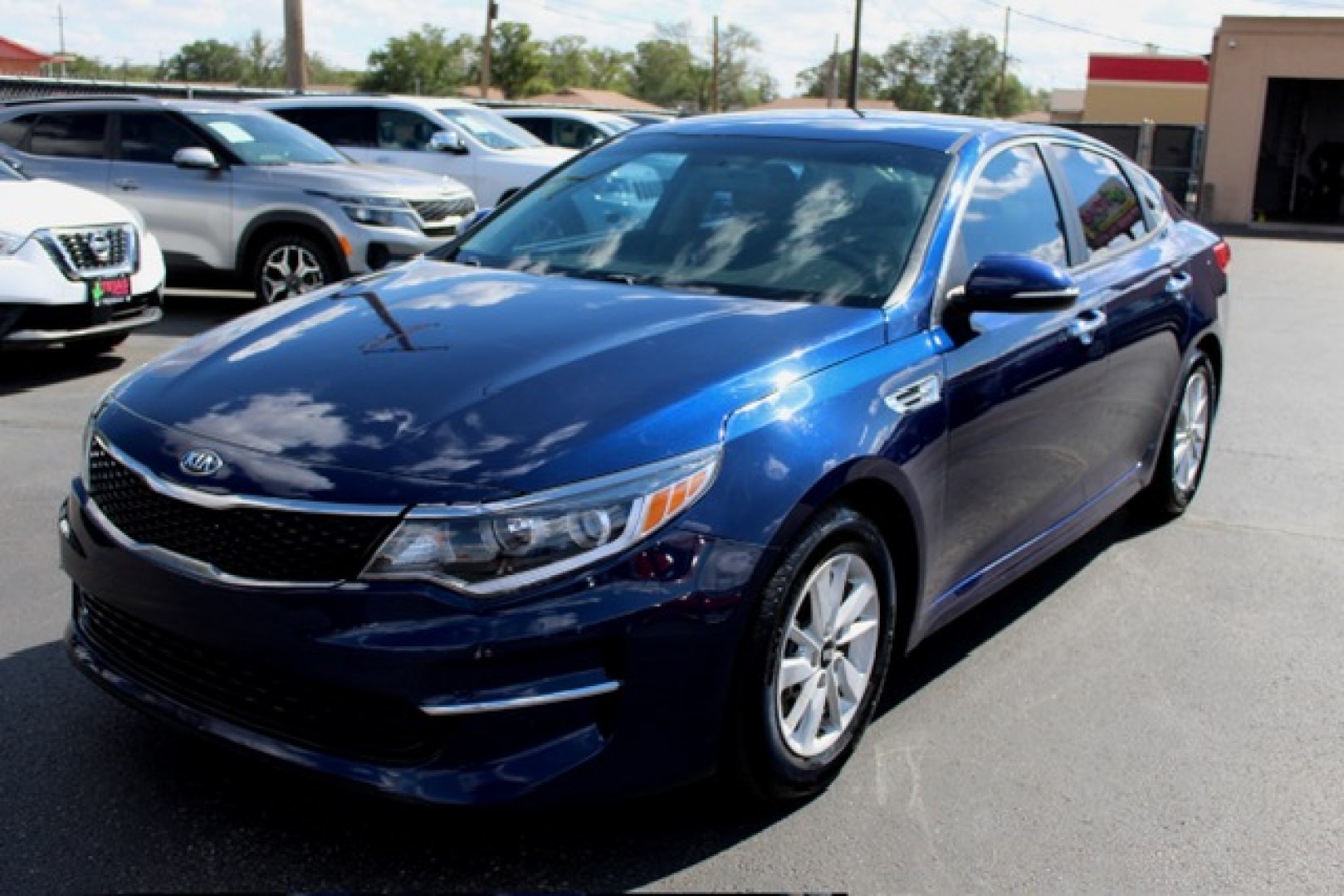 2018 Kia Optima LX (5XXGT4L3XJG) with an 2.4L L4 DOHC 16V engine, 6A transmission, located at 4110 Avenue Q, Lubbock, 79412, 33.556553, -101.855820- Photo#1