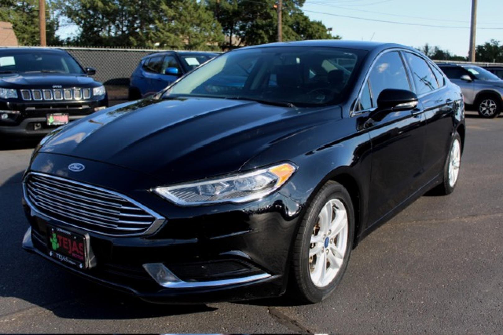 2018 Ford Fusion SE (3FA6P0HD6JR) with an 1.5L L4 DOHC 16V engine, 6A transmission, located at 4110 Avenue Q, Lubbock, 79412, 33.556553, -101.855820- Photo#1
